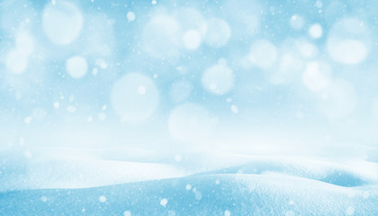 Winter background. Winter bright landscape with snowdrifts and falling snow.