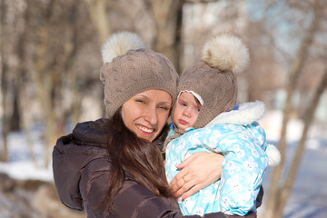 Mother and child on a winter walk