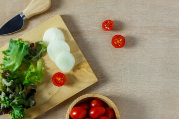 Top view cooking salad on wood table with copy space.