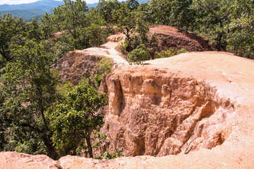 Thailand canyon with red rock cliff