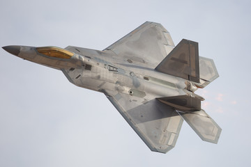 F-22 Raptor in a turn, with afterburner on