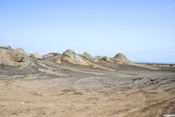 Fototapeta na wymiar Cones of mud volcanoes in Gobustan, Azerbaijan.