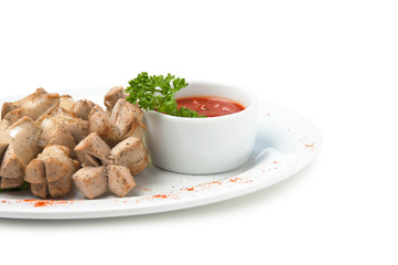 chopped sausages fried with vegetables and spices