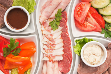  assorted sausages and vegetables