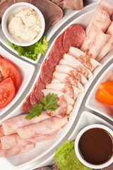  assorted sausages and vegetables
