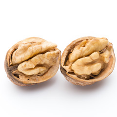 Walnut and walnut kernel isolated on the white background.