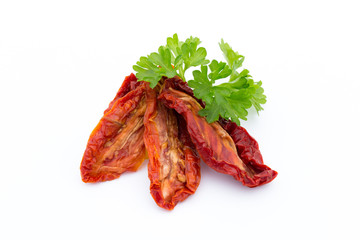 Dried tomatoes isolated on white background.