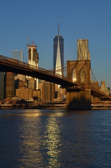 Obraz na płótnie Canvas Freedom tower and Brooklyn bridge