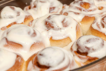 Stack of freshly cinnabon, French buns with cinnamon and cream