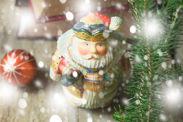 Santa Noel decor in magic snowflakes and christmas tree. Winter