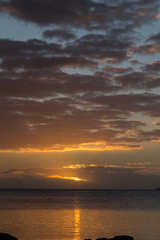 Fototapeta na wymiar Sunset on the ocean coast. Sky Fiji