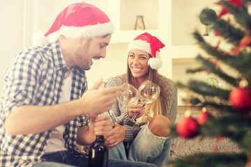 Happy smiling family at home celebrating New Year's eve