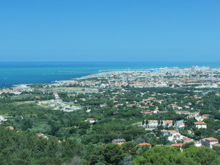 Obraz premium Spectacular aerial panorama of Livorno city made from the nearby hills of Montenero on sunny day, Tuscany Italy . Photo taken with polarized filter