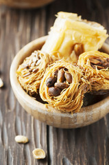 Traditional arabic dessert Kunafa with honey