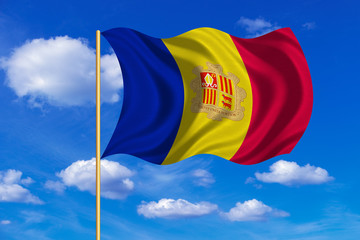 Flag of Andorra waving on blue sky background