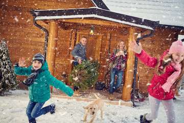 happy family in winter holidays with children