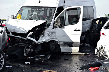Car crash detail with damaged automobile