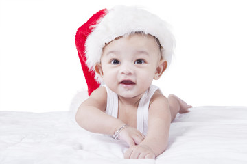 Healthy baby with Christmas hat
