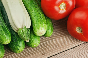 vegetables and a bottle of oil, still life