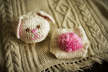 cozy knitted clothes for a newborn for photosession