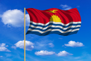 Flag of Kiribati waving on blue sky background