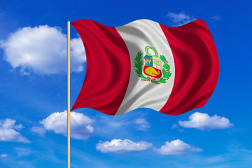 Flag of Peru waving on blue sky background