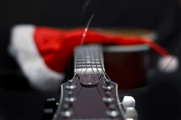 Acoustic guitar and Santa's cone