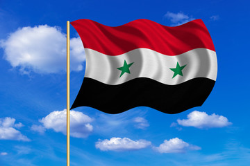 Flag of Syria waving on blue sky background