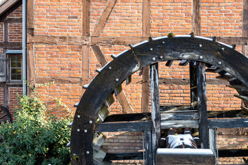 wooden wheel of an historic water mill © Björn Wylezich