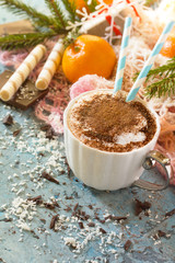 Christmas frame. Coffee with whipped cream, cappuccino cup and c