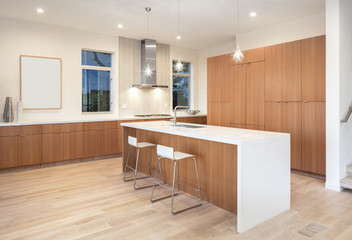 Amazing new contemporary wooden Kitchen with kitchen Island and bar stools.