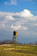 Hunting watchtower on a meadow at sunny autumn day, Deliblatska pescara, Serbia