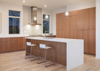 Amazing new contemporary wooden Kitchen with kitchen Island and bar stools.