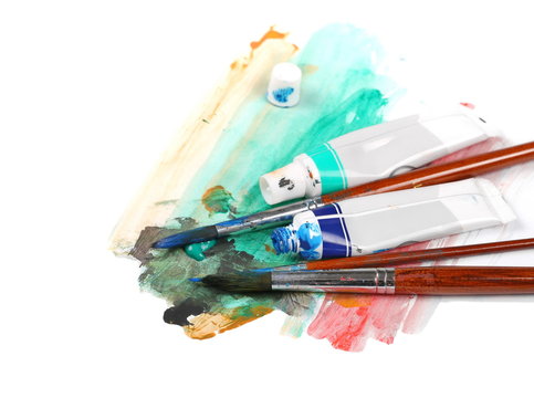 brush, tubes of paint and scratch isolated on white