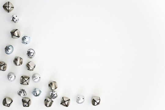Blue and Silver Christmas Bells Flat lay composition for bloggers, magazines, social media and artists. Top view.