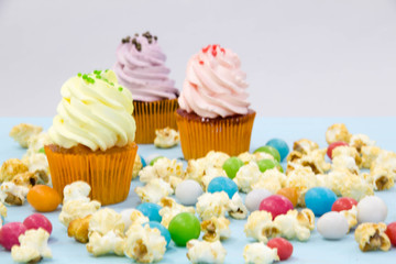 Party background with cupcakes and confetti