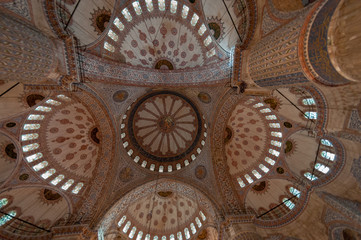 Fototapeta na wymiar Ceiling and central dome of the Blue Mosque, Sultan Ahmet district, Istanbul, Turkey