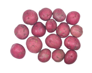 Ripe organic red potatoes on white background