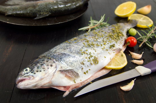 trout on a wooden table