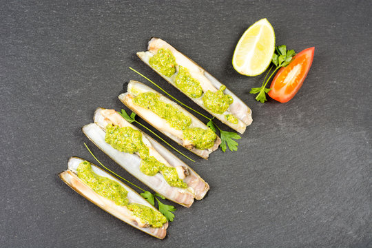 Razor clams - navajas - with green parsley pesto