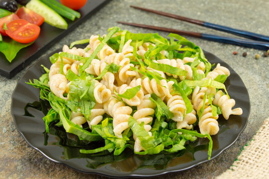 wild onion pasta with chopsticks