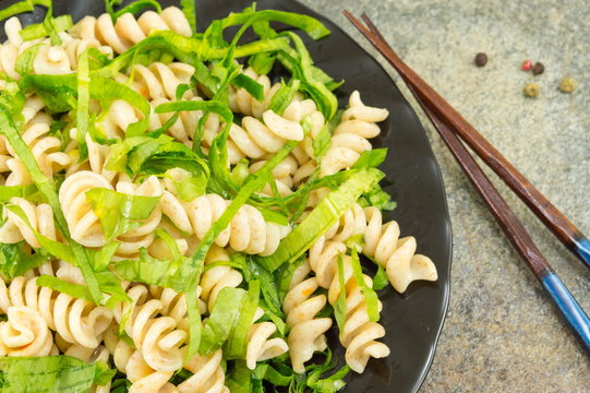 wild onion pasta with chopsticks