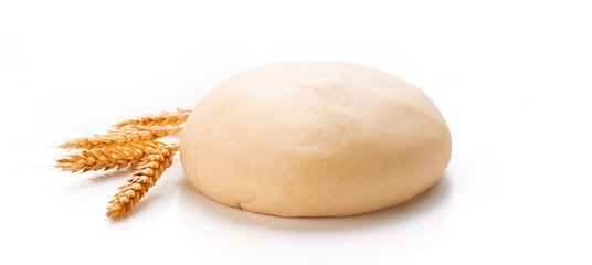 Dough with ears of wheat isolated on white background