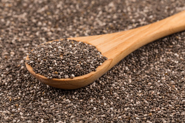 Chia seeds in wooden spoon