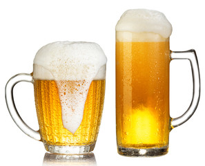 cold mug of beer with foam isolated on white background