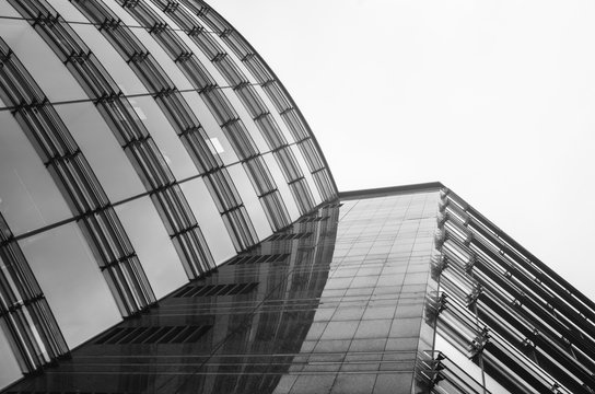 Business centre abstract architecture glass perspective view. Sky background. Black and white.