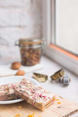 Festive chocolate block tied with string. Shallow depth of field.