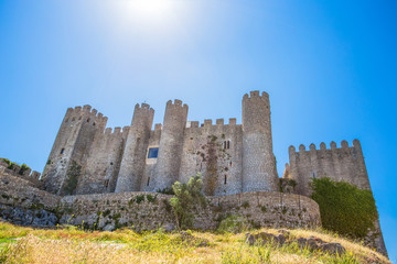 Fototapeta na wymiar Medieval castle in the portuguese village of Obidos/ Castle/ fortress/ Portugal
