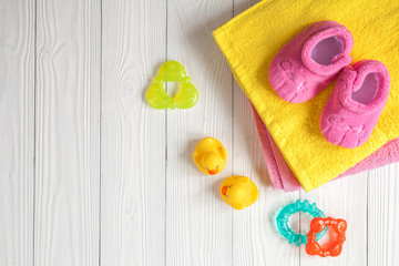baby accessories for bath on wooden background