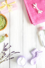Natural organic cosmetics for baby with lavender on wooden background